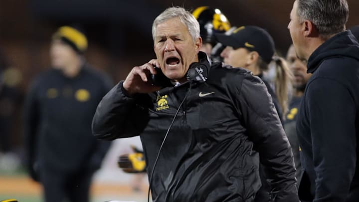 Oct 8, 2022; Champaign, Illinois, USA;  Iowa Hawkeyes head coach Kirk Ferentz reacts after a penalty was called on an assistant coach during a game against the Illinois fighting Illini at Memorial Stadium. Mandatory Credit: Ron Johnson-Imagn Images