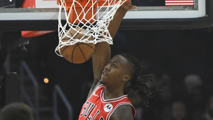 Oct 8, 2024; Cleveland, Ohio, USA; Chicago Bulls guard Ayo Dosunmu (11) dunks in the first quarter against the Cleveland Cavaliers at Rocket Mortgage FieldHouse. Mandatory Credit: David Richard-Imagn Images