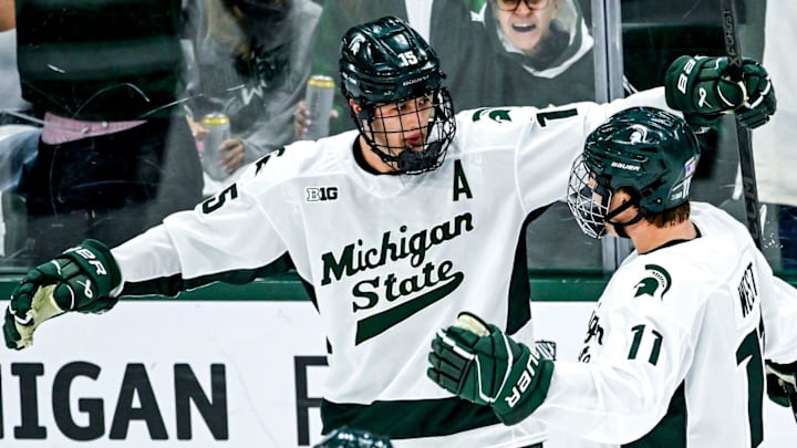 Michigan State's Charlie Stramel, left, celebrates his goal with Owen West during the second period against New Hampshire on Thursday, Oct. 9, 2025, at Munn Ice Arena in East Lansing.