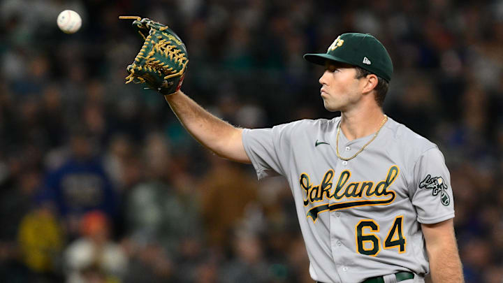 Aug 29, 2023; Seattle, Washington, USA; Oakland Athletics starting pitcher Ken Waldichuk (64) during the fourth inning against the Seattle Mariners at T-Mobile Park. Mandatory Credit: Steven Bisig-Imagn Images