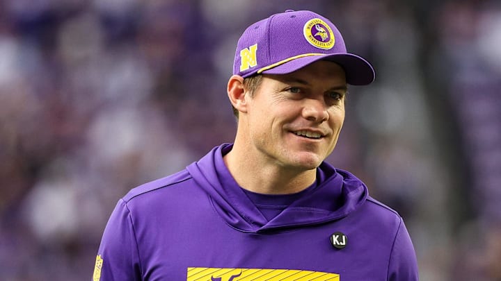 Minnesota Vikings coach Kevin O'Connell stands on the sidelines.