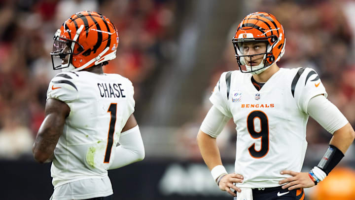 Oct 8, 2023; Glendale, Arizona, USA; Cincinnati Bengals quarterback Joe Burrow (9) and wide receiver Ja'Marr Chase (1) against the Arizona Cardinals in the second half at State Farm Stadium. Mandatory Credit: Mark J. Rebilas-Imagn Images