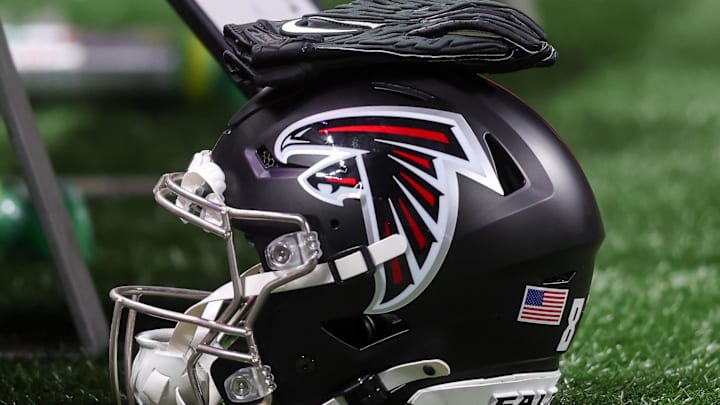 Aug 15, 2025; Atlanta, Georgia, USA; Atlanta Falcons helmet on the sideline against the Tennessee Titans in the first quarter at Mercedes-Benz Stadium. 