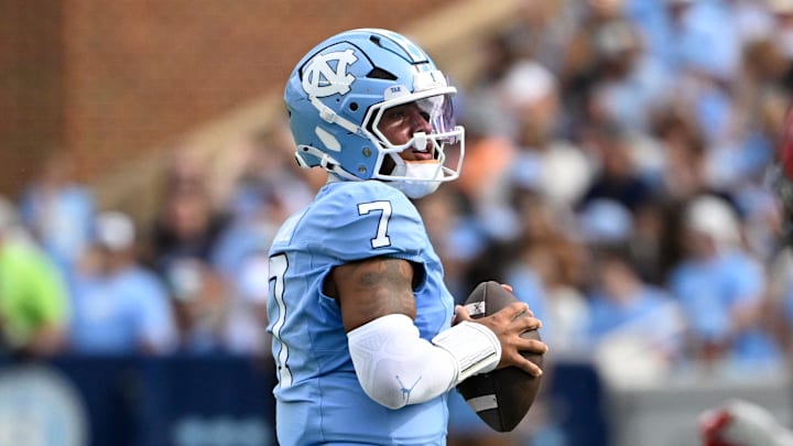 Sep 13, 2025; Chapel Hill, North Carolina, USA; North Carolina Tar Heels quarterback Gio Lopez (7) looks to pass in the first quarter at Kenan Stadium. Mandatory Credit: Bob Donnan-Imagn Images Sep 13, 2025; Chapel Hill, North Carolina, USA; North Carolina Tar Heels quarterback Gio Lopez (7) looks to pass in the first quarter at Kenan Stadium. Mandatory Credit: Bob Donnan-Imagn Images