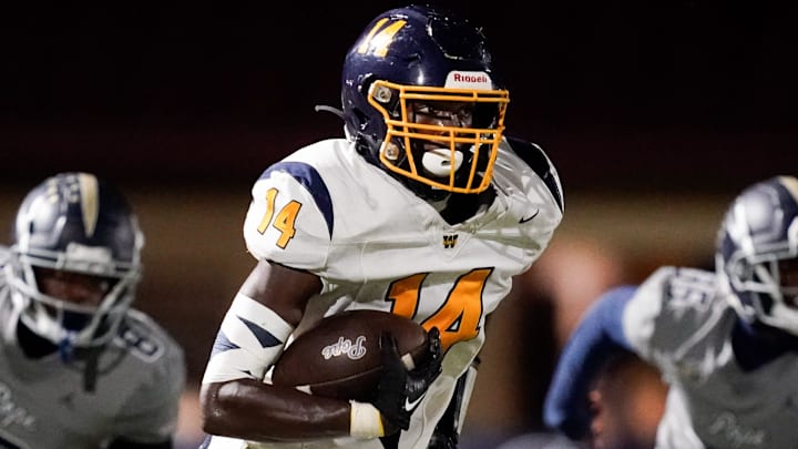 Webb’s Joel Wyatt (14) runs the ball against Pope John Paul II during the second half at Pope Saint John Paul II Preparatory School in Hendersonville, Tenn., Friday, Sept. 13, 2024.