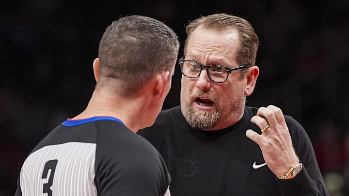 Mar 10, 2025; Atlanta, Georgia, USA; Philadelphia 76ers head coach Nick Nurse reacts to official Nick Buchert (3) during the game against the Atlanta Hawks during the second half at State Farm Arena. Mandatory Credit: Dale Zanine-Imagn Images