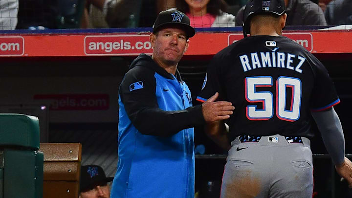 May 24, 2025; Anaheim, California, USA; Miami Marlins catcher Agustin Ramirez (50) is greeted by manager Clayton McCullough (86) after scoring a run against the Los Angeles Angels during the fifth inning at Angel Stadium. Mandatory Credit: Gary A. Vasquez-Imagn Images May 24, 2025; Anaheim, California, USA; Miami Marlins catcher Agustin Ramirez (50) is greeted by manager Clayton McCullough (86) after scoring a run against the Los Angeles Angels during the fifth inning at Angel Stadium. Mandatory Credit: Gary A. Vasquez-Imagn Images