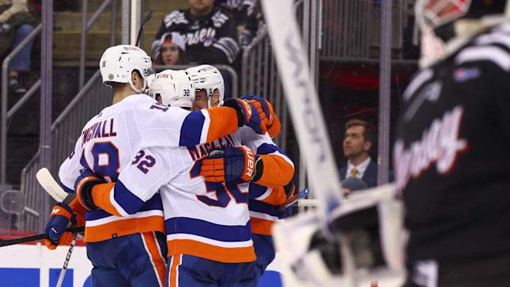 Apr 15, 2024; Newark, New Jersey, USA; New York Islanders center Kyle MacLean (32) celebrates his