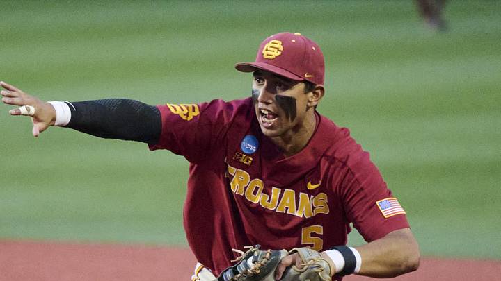 May 31, 2025; Corvallis, OR, USA; USC infielder Adrian Lopez (5) waves off a teammate as he tags first base during the ninth inning against Saint Mary's at Goss Stadium. May 31, 2025; Corvallis, OR, USA; USC infielder Adrian Lopez (5) waves off a teammate as he tags first base during the ninth inning against Saint Mary's at Goss Stadium.