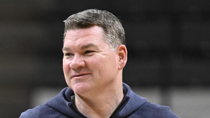 Mar 25, 2026; San Jose, CA, USA; Arizona Wildcats head coach Tommy Lloyd smiles during a practice session ahead of the west regional of the men's 2026 NCAA Tournament at SAP Center. Mandatory Credit: Eakin Howard-Imagn Images