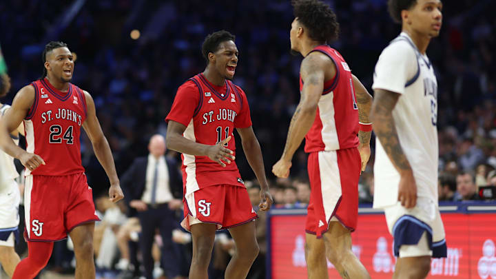 Jan 17, 2026; Philadelphia, Pennsylvania, USA; St. John's basketball guard Ian Jackson (11) reacts to a score against the Villanova Wildcats during the second half at Xfinity Mobile Arena.