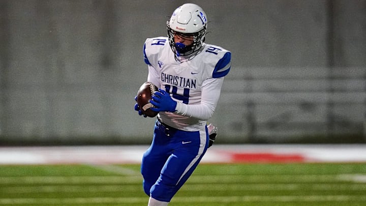 Lexington Christian Eagles Conrad Hart (14) runs with the ball in the third quarter of a high school football game between the Beechwood Tigers and Lexington Christian Eagles, Friday, Nov. 29, 2024, at Edgar McNabb Stadium in Fort Mitchell, Ky. Tigers won 44-24.