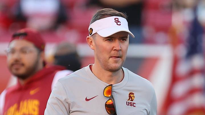 Oct 15, 2022; Salt Lake City, Utah, USA; USC Trojans head coach Lincoln Riley watches warm ups prior to a game against the Utah Utes at Rice-Eccles Stadium.   