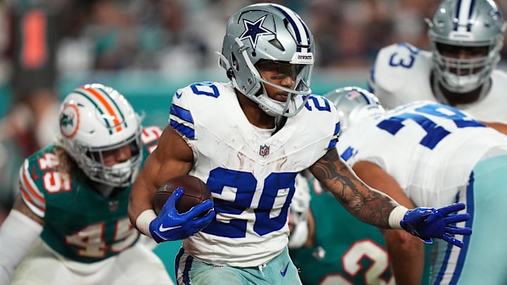 Dec 24, 2023; Miami Gardens, Florida, USA; Dallas Cowboys running back Tony Pollard (20) runs the