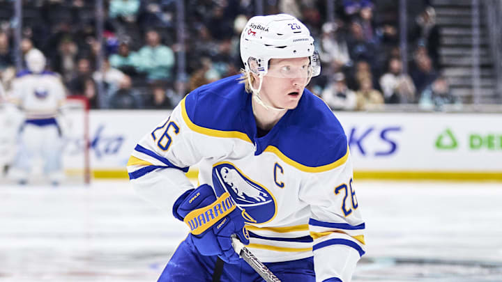 Dec 14, 2025; Seattle, Washington, USA; Buffalo Sabres defenseman Rasmus Dahlin (26) looks to pass during the third period against the Seattle Kraken at Climate Pledge Arena. Mandatory Credit: Blake Dahlin-Imagn Images
