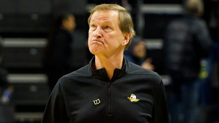 Oregon head coach Dana Altman looks toward the scoreboard as he walks off the court as the Oregon Ducks host the Minnesota Golden Gophers on Feb. 17, 2026, at Matthew Knight Arena in Eugene, Oregon.