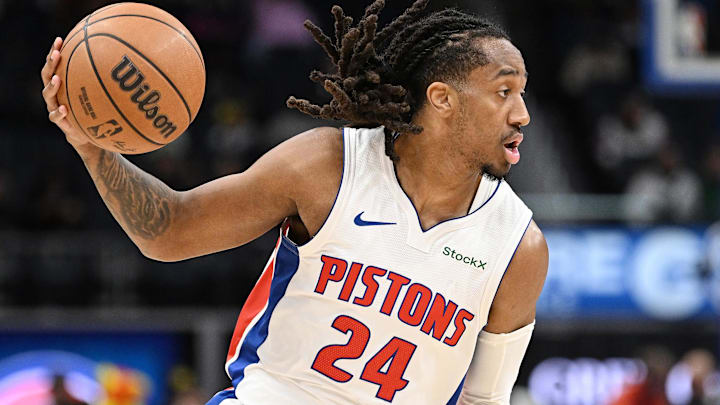 Detroit Pistons guard Daniss Jenkins (24) controls the ball against the Detroit Pistons in the third quarter at Little Caesars Arena.