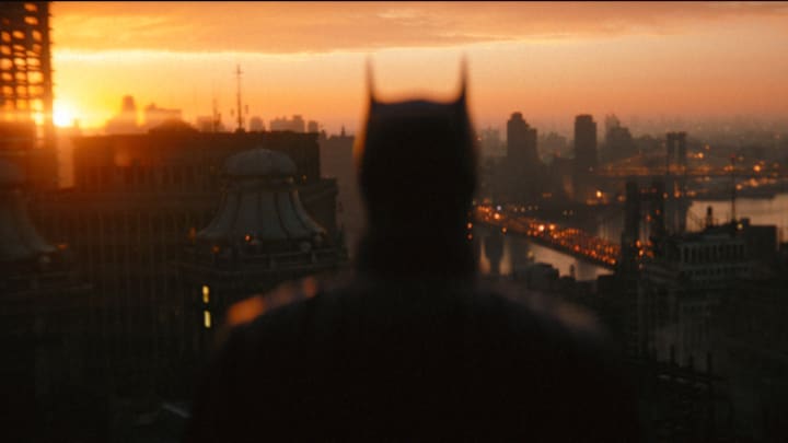 ROBERT PATTINSON as Batman in Warner Bros. Pictures’ action adventure “THE BATMAN,” a Warner Bros. Pictures release. Courtesy of Warner Bros. Pictures/ ™ & © DC Comics. Pictures release. © 2021 Warner Bros. Entertainment Inc. All Rights Reserved.