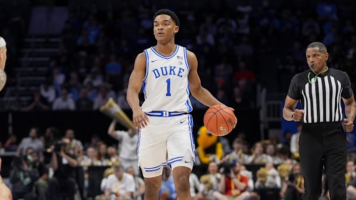Mar 13, 2025; Charlotte, NC, USA; Duke Blue Devils guard Caleb Foster (1) brings the ball up court against the Georgia Tech Yellow Jackets during the second half at Spectrum Center.