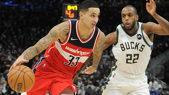 Feb 1, 2022; Milwaukee, Wisconsin, USA; /Washington Wizards forward Kyle Kuzma (33) drives to the basket against Milwaukee Bucks forward Khris Middleton (22) in the second half at Fiserv Forum. Mandatory Credit: Michael McLoone-Imagn Images Feb 1, 2022; Milwaukee, Wisconsin, USA; /Washington Wizards forward Kyle Kuzma (33) drives to the basket against Milwaukee Bucks forward Khris Middleton (22) in the second half at Fiserv Forum. Mandatory Credit: Michael McLoone-Imagn Images