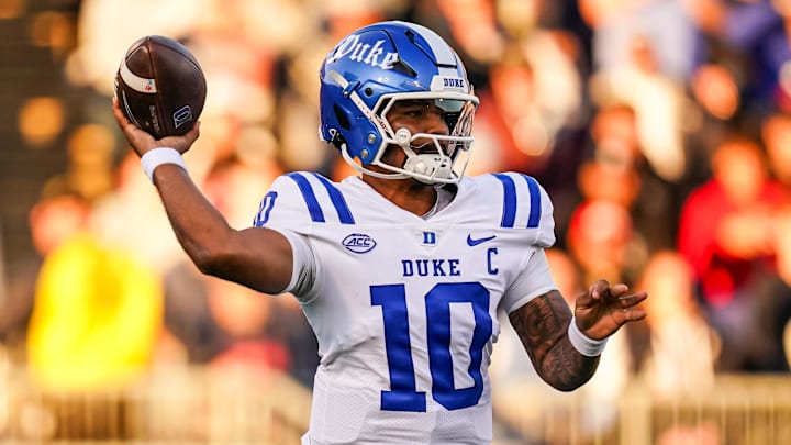 Nov 8, 2025; East Hartford, Connecticut, USA; Duke Blue Devils quarterback Darian Mensah (10) throws a pass against the UConn Huskies in the first quarter at Pratt & Whitney Stadium at Rentschler Field. Mandatory Credit: David Butler II-Imagn Images