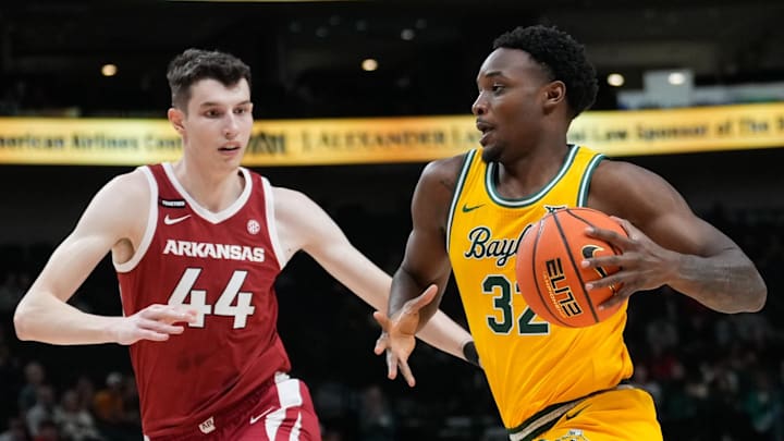 Baylor Bears guard Jalen Celestine (32) drives to the basket against Arkansas Razorbacks forward Zvonimir Ivisic (44) during the first half at American Airlines Center. 