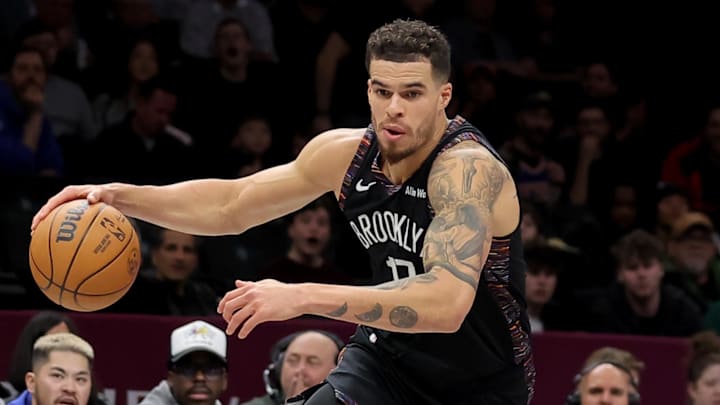 Jan 9, 2026; Brooklyn, New York, USA; Brooklyn Nets forward Michael Porter Jr. (17) drives to the basket against Los Angeles Clippers guard James Harden (1) during the third quarter at Barclays Center. Mandatory Credit: Brad Penner-Imagn Images