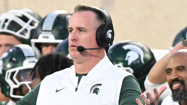 Oct 10, 2026; East Lansing, Michigan, USA; Michigan State Spartans head coach Pat Fitzgerald protests calls that went against the Michigan State Spartans during the fourth quarter against Illinois Fighting Illini at Spartan Stadium. Mandatory Credit: Dale Young-Imagn Images Oct 10, 2026; East Lansing, Michigan, USA; Michigan State Spartans head coach Pat Fitzgerald protests calls that went against the Michigan State Spartans during the fourth quarter against Illinois Fighting Illini at Spartan Stadium. Mandatory Credit: Dale Young-Imagn Images