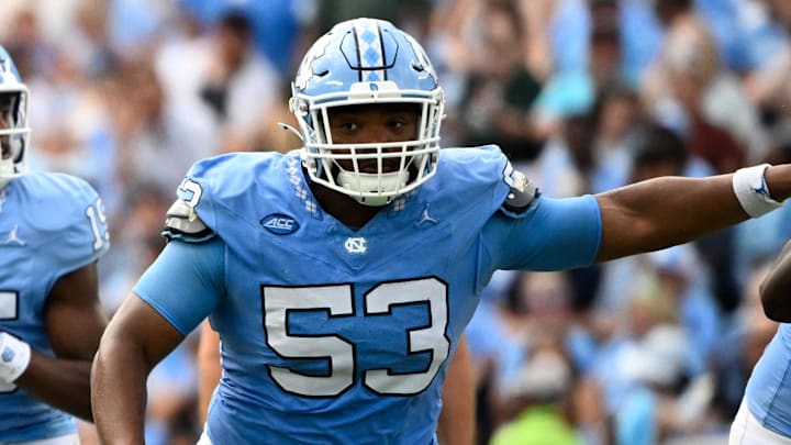 Sep 7, 2024; Chapel Hill, North Carolina, USA; North Carolina Tar Heels quarterback Conner Harrell (15) looks to pass as offensive linemen Trevyon Green (78) and Willie Lampkin (53) block in the second quarter at Kenan Memorial Stadium. Mandatory Credit: Bob Donnan-Imagn Images