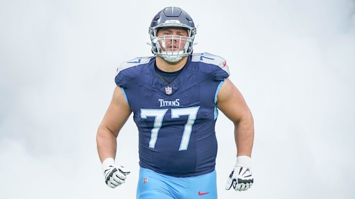Tennessee Titans offensive tackle Peter Skoronski (77) enters the field before the Titans play the Bengals at Nissan Stadium in Nashville, Tenn., Sunday, Dec. 15, 2024. Tennessee Titans offensive tackle Peter Skoronski (77) enters the field before the Titans play the Bengals at Nissan Stadium in Nashville, Tenn., Sunday, Dec. 15, 2024.