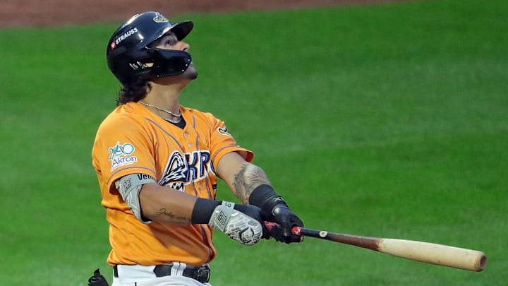 RubberDucks designated hitter Ralphy Velazquez watches his shot down the first-base line during a game Aug. 21, 2025, in Akron.