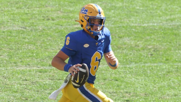 Oct 4, 2025; Pittsburgh, Pennsylvania, USA;  Pittsburgh Panthers quarterback Mason Heintschel (6) scrambles with  the ball against the Boston College Eagles during the fourth quarter at Acrisure Stadium. Mandatory Credit: Charles LeClaire-Imagn Images