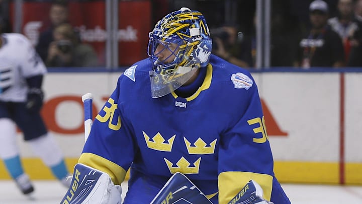 Sep 25, 2016; Toronto, Ontario, Canada; Team Sweden goalie Henrik Lundqvist (30) looks to play the puck against Team Europe during the first period  of a semifinal game in the 2016 World Cup of Hockey at Air Canada Centre. Mandatory Credit: John E. Sokolowski-Imagn Images