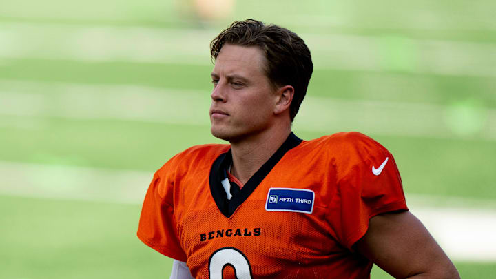 Cincinnati Bengals quarterback Joe Burrow (9) runs onto the field during Bengals Camp practice at Paycor Stadium in Cincinnati on Aug. 2, 2025.