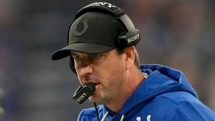 Indianapolis Colts head coach Shane Steichen high-fives players after a touchdown