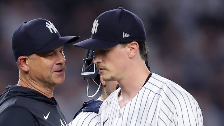 Aug 7, 2026; Bronx, New York, USA; New York Yankees manager Aaron Boone (17) takes starting pitcher Max Fried (54) out of the game against the Atlanta Braves during a pitching change during the seventh inning at Yankee Stadium. Mandatory Credit: Brad Penner-Imagn Images Aug 7, 2026; Bronx, New York, USA; New York Yankees manager Aaron Boone (17) takes starting pitcher Max Fried (54) out of the game against the Atlanta Braves during a pitching change during the seventh inning at Yankee Stadium. Mandatory Credit: Brad Penner-Imagn Images