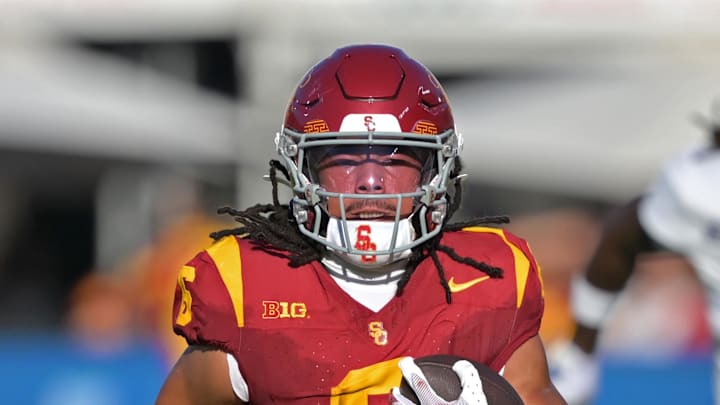 Sep 6, 2025; Los Angeles, California, USA;  USC Trojans wide receiver Makai Lemon (6) runs down field for a touchdown on a pass play during the first half against the Georgia Southern Eagles at the Los Angeles Memorial Coliseum. Mandatory Credit: Jayne Kamin-Oncea-Imagn Images
