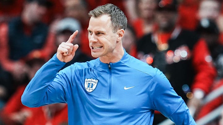 Duke Blue Devils head coach Jon Scheyer yells in the first half as his team fell behind by 10 points in the first half. The Duke Blue Devils rallied from being down nine points at the half to beat Louisville 84-73 Tuesday night at KFC Yum Center January 6, 2026.