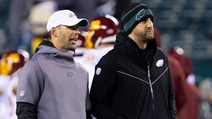 Dec 21, 2021; Philadelphia, Pennsylvania, USA; Philadelphia Eagles head coach Nick Sirianni (R) and defensive coordinator Jonathan Gannon (L) before action against the Washington Football Team at Lincoln Financial Field. Mandatory Credit: Bill Streicher-Imagn Images