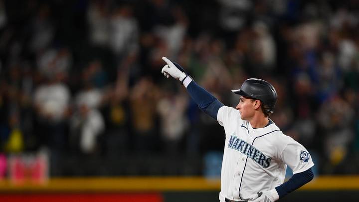 May 18, 2026; Seattle, Washington, USA; Seattle Mariners third baseman Colt Emerson (4) runs the bases after hitting a 3-run home run and his first MLB hit against the Chicago White Sox during the eighth inning at T-Mobile Park. Mandatory Credit: Steven Bisig-Imagn Images