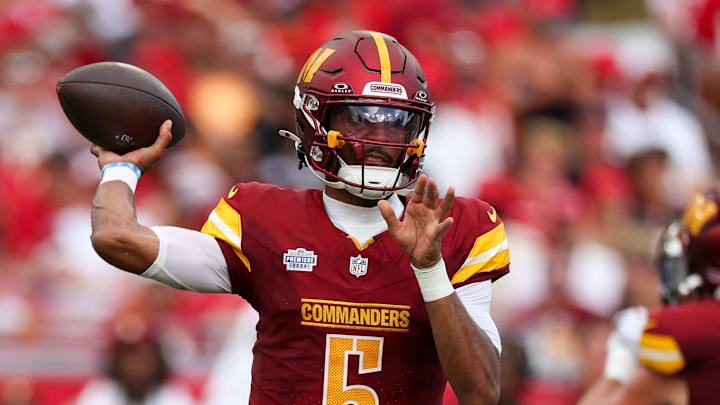 Washington Commanders quarterback Jayden Daniels (5) drops back to pass against the Tampa Bay Buccaneers in the third quarter at Raymond James Stadium. Mandatory Credit: Nathan Ray Seebeck-Imagn Images Washington Commanders quarterback Jayden Daniels (5) drops back to pass against the Tampa Bay Buccaneers in the third quarter at Raymond James Stadium. Mandatory Credit: Nathan Ray Seebeck-Imagn Images