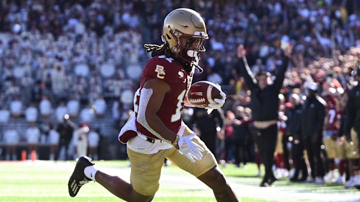 Nov 9, 2024; Chestnut Hill, Massachusetts, USA; Boston College Eagles wide receiver Lewis Bond (11) runs for a touchdown against the Syracuse Orange during the first half at Alumni Stadium. Mandatory Credit: Brian Fluharty-Imagn Images