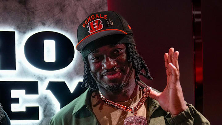 Cincinnati Bengals first round draft pick Shemar Stewart and his dad Moe Marquez show off custom jewelry they had made for each other in the Bengals locker room at Paycor Stadium in downtown Cincinnati on Friday, April 25, 2025.