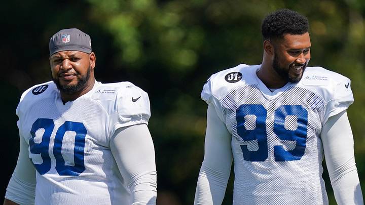 Indianapolis Colts defensive tackles Grover Stewart (90) and DeForest Buckner (99)