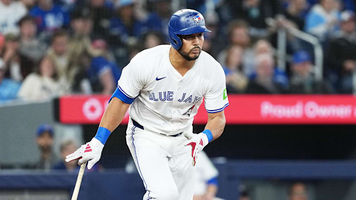 May 3, 2025; Toronto, Ontario, CAN; Toronto Blue Jays designated hitter Anthony Santander (25) reacts after hitting a double against the Cleveland Guardians during the third inning at Rogers Centre. 
