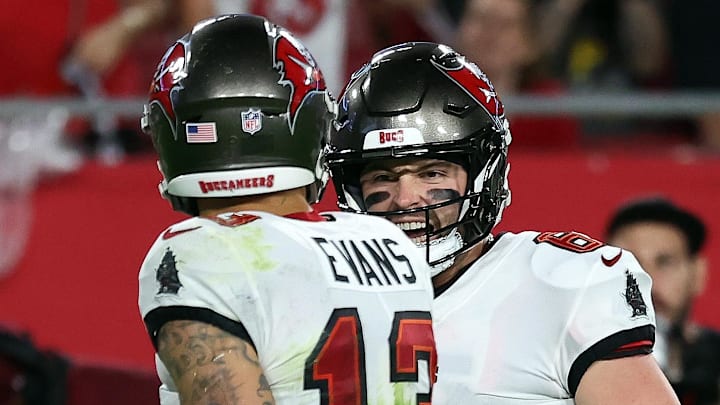 Dec 3, 2023; Tampa, Florida, USA;Tampa Bay Buccaneers quarterback Baker Mayfield (6) celebrates with wide receiver Mike Evans (13) after he scored a touchdown  against the Carolina Panthers  during the second half at Raymond James Stadium. Mandatory Credit: Kim Klement Neitzel-Imagn Images