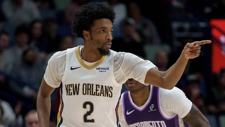 Feb 9, 2026; New Orleans, Louisiana, USA; New Orleans Pelicans forward Herbert Jones (2) reacts after a basket against Sacramento Kings guard Daeqwon Plowden (29) during the first half at Smoothie King Center. Mandatory Credit: Matthew Hinton-Imagn Images