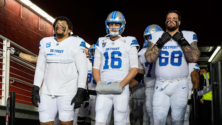Detroit Lions offensive tackle Penei Sewell (58), quarterback Jared Goff (16) and offensive tackle Taylor Decker (68) 