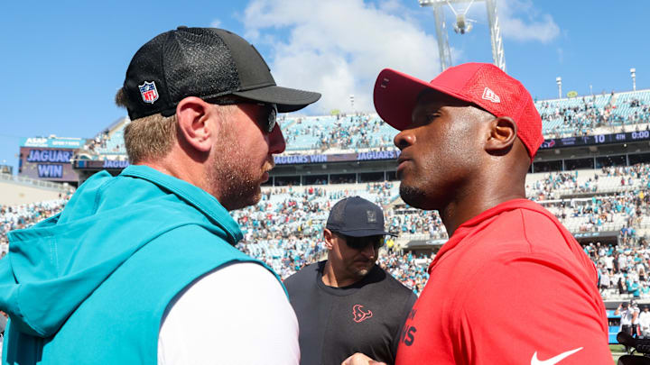 Sep 21, 2025; Jacksonville, Florida, USA; Jacksonville Jaguars head coach Liam Coen and Houston Texans head coach DeMeco Ryans shake hands after the game at EverBank Stadium. 