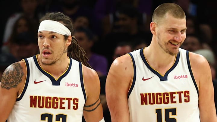 Mar 24, 2026; Phoenix, Arizona, USA; Denver Nuggets center Nikola Jokic (15) and forward Aaron Gordon (32) against the Phoenix Suns at Mortgage Matchup Center. Mandatory Credit: Mark J. Rebilas-Imagn Images